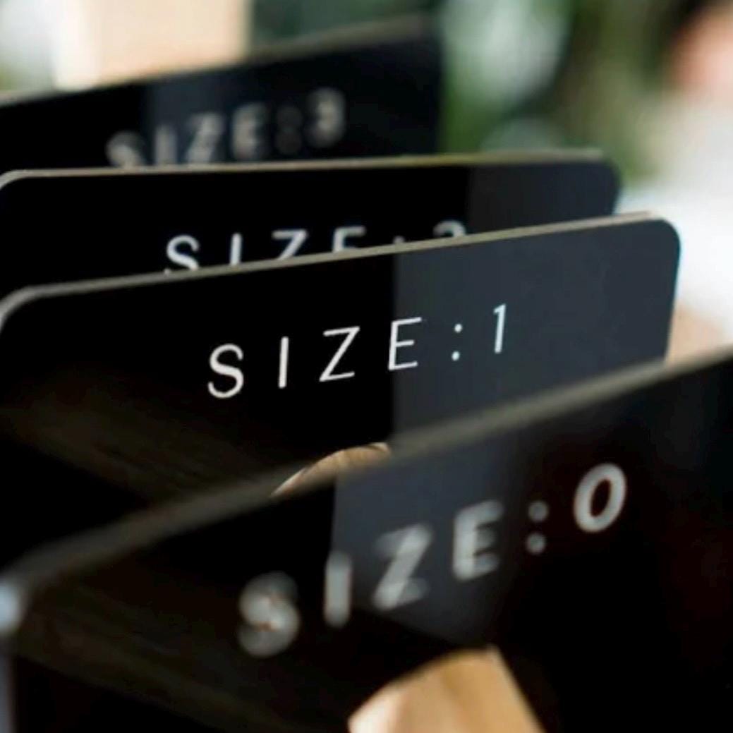 Minimal acrylic wardrobe organiser dividers for boutiques