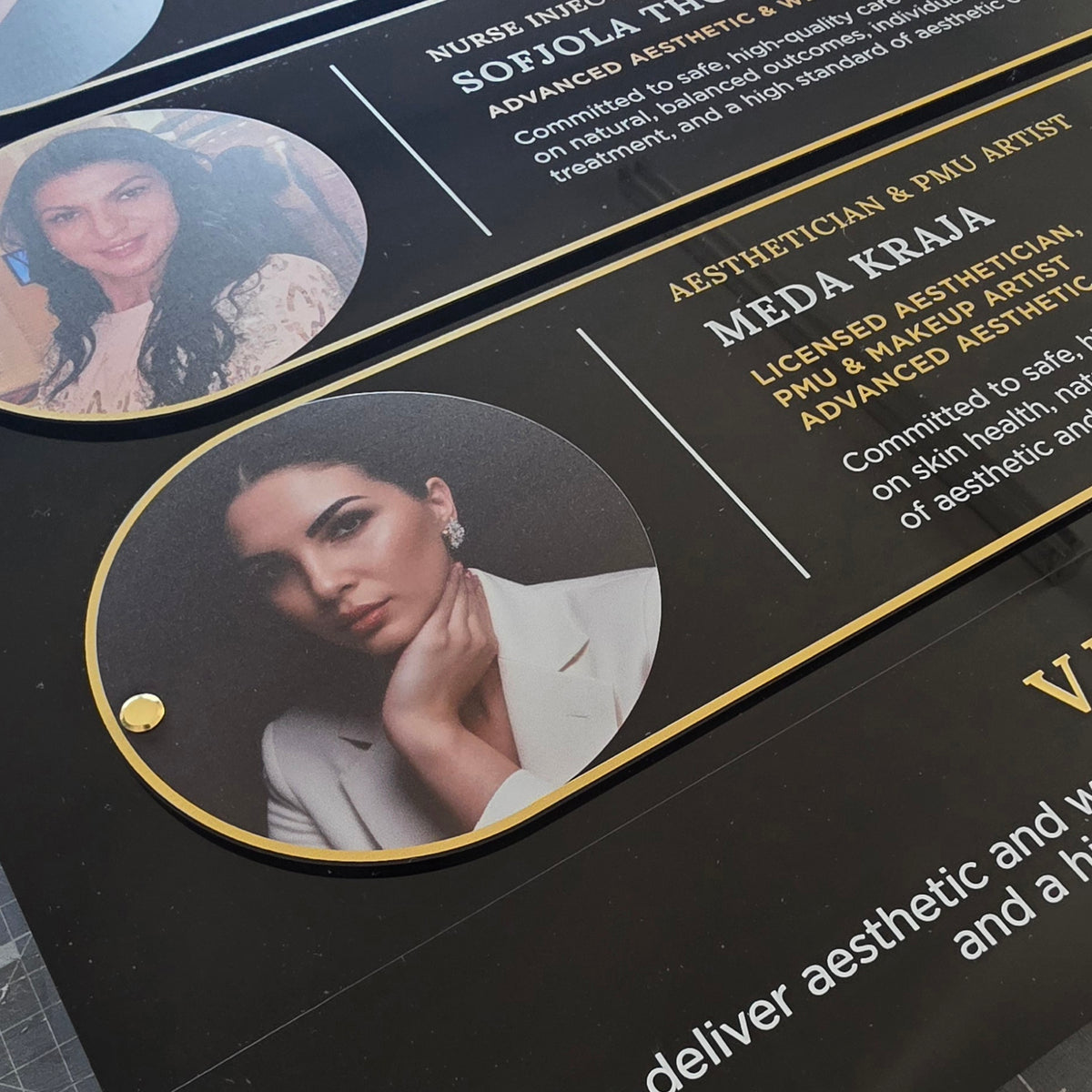 Custom wall directory sign branded with Beauty Salon employess and Rolls