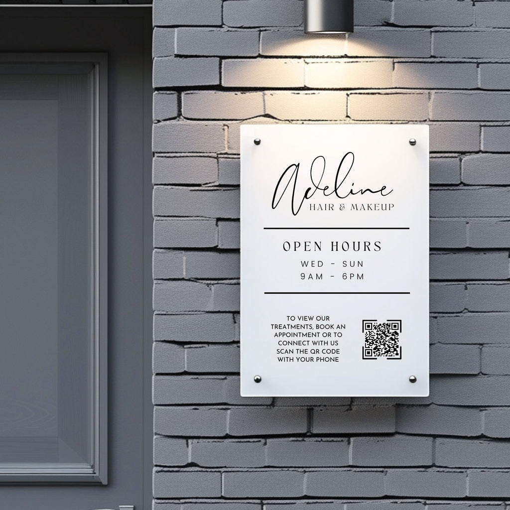 shop opening times and QR code printed on to a acrylic sign that is mounted to the wall using standoff fixings
