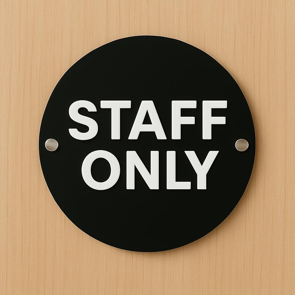 Wall-mounted matte black acrylic STAFF ONLY door sign with a modern white 3D acrylic lettering. Features silver standoff fixings for easy installation. Available in multiple colourways. Ideal for businesses, restaurants, offices, public washrooms