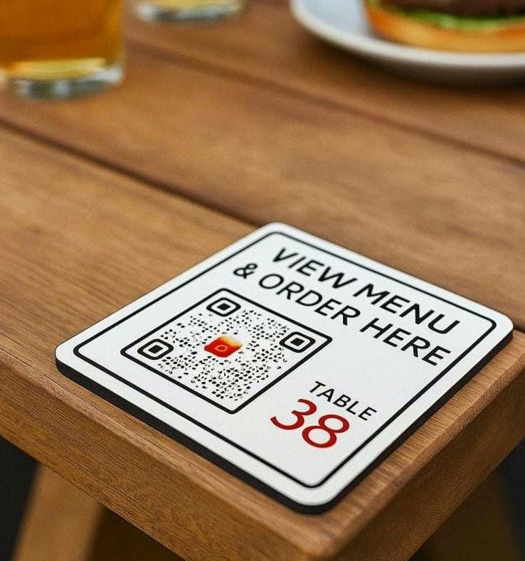 Restaurant or bar table ordering QR code plaques. personalised with own details, table number and custom QR code